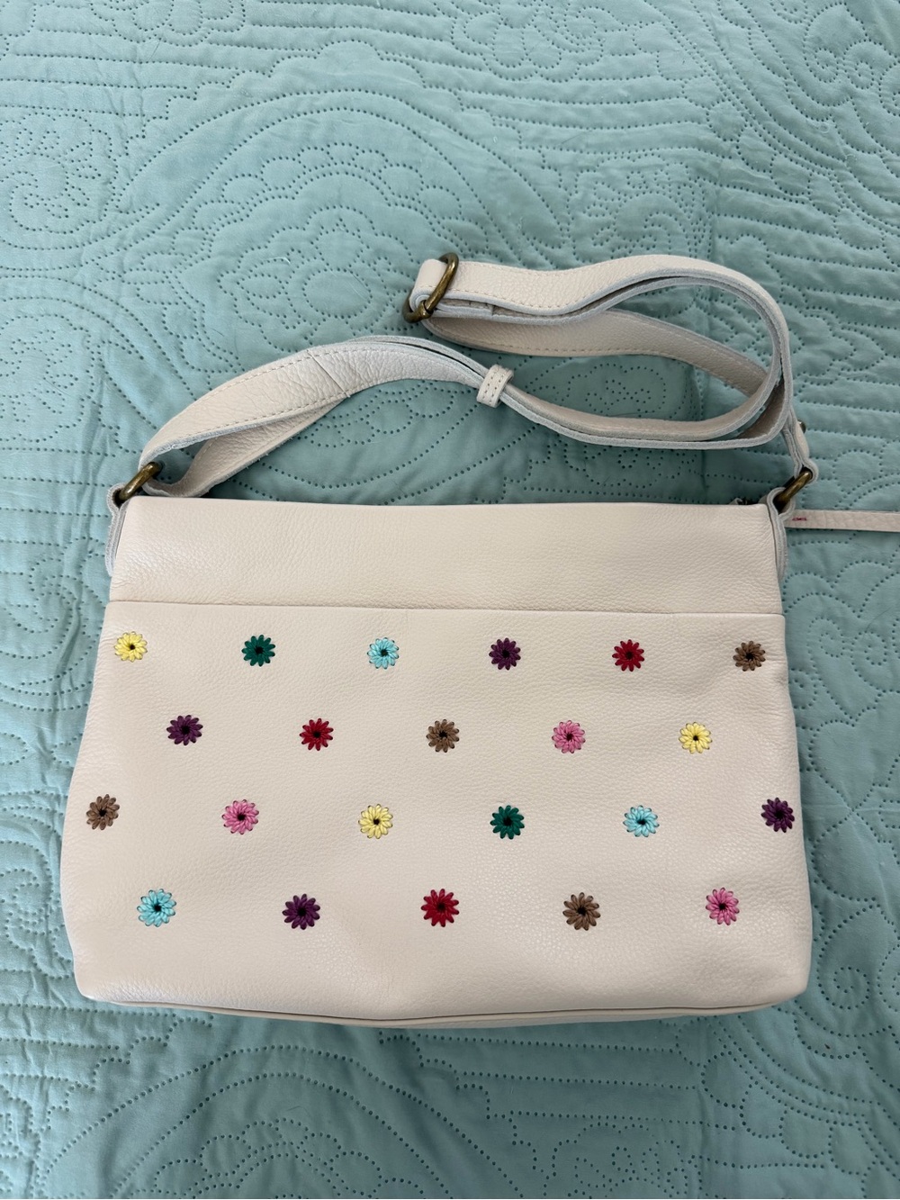The Sak Cream Leather Crossbody Bag with Multicolor Floral Studs